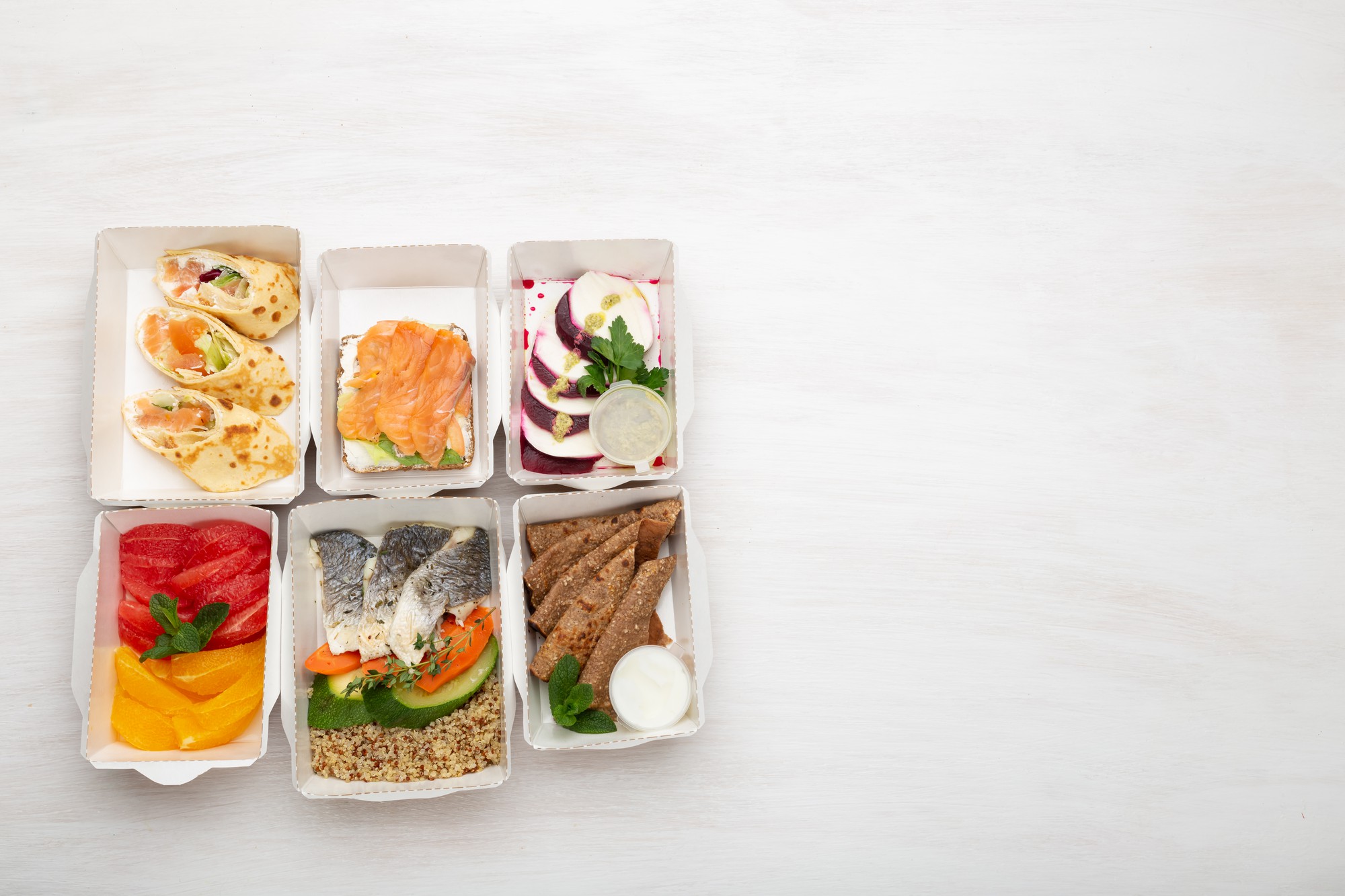 Assorted meal boxes arranged on a table
